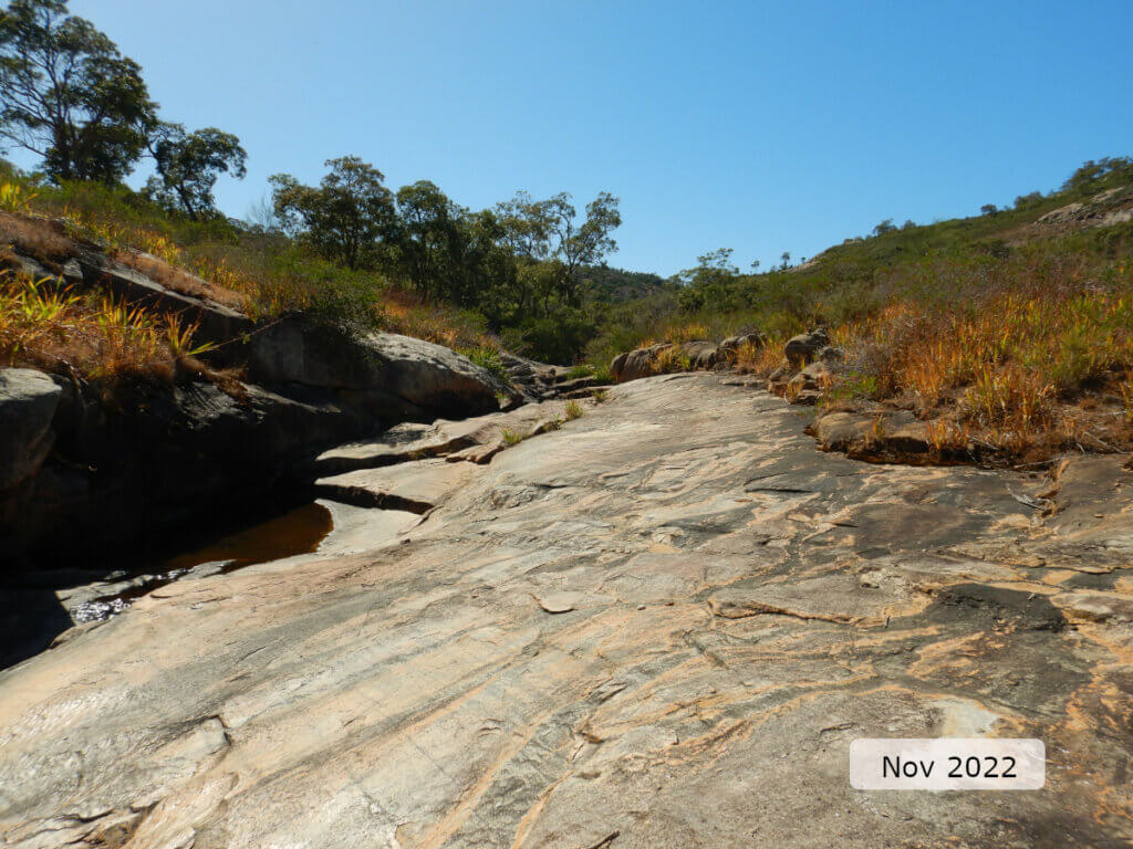 An image showing the open bedrock, and rock shelf on the left, that dominates the Susannah Brook site.